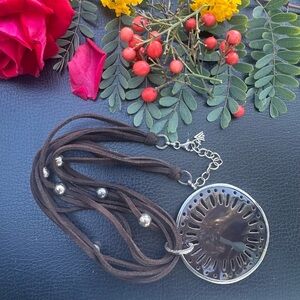 Silpada  carved pen shell  Necklace on 5 strands suede cord